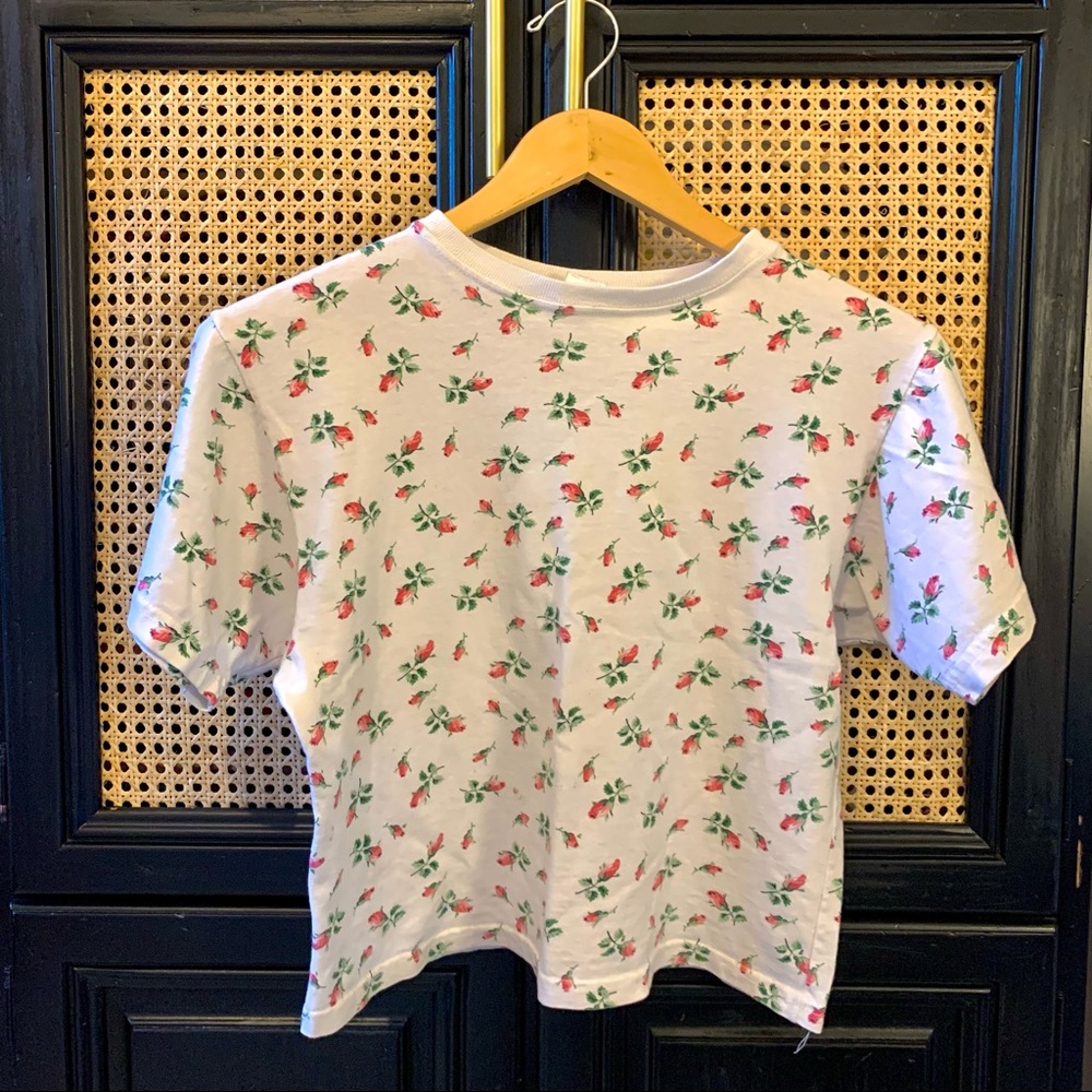 Vintage baby tee with cropped fit.
